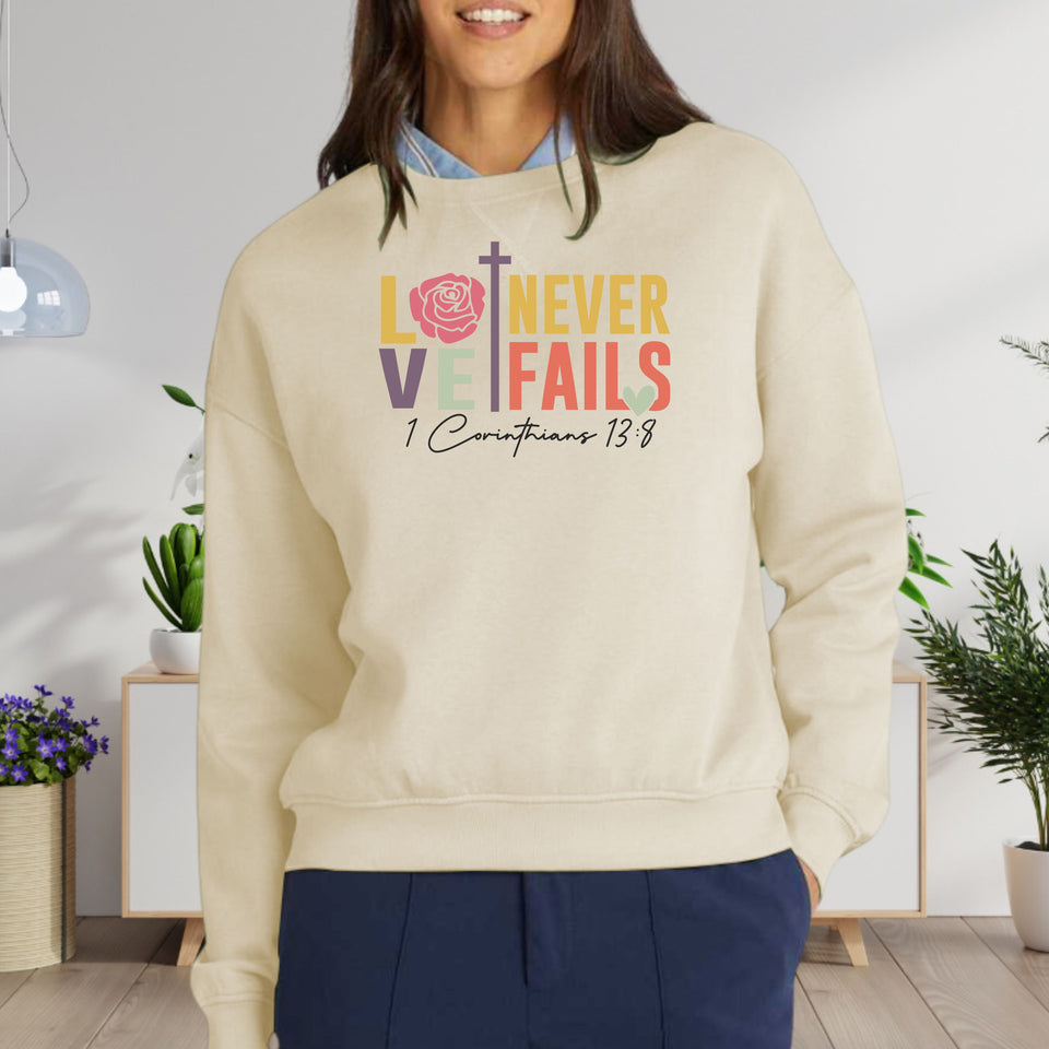 Love Never Fails Women's Fleece Crewneck Sweatshirt
